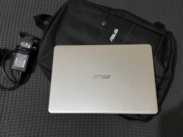 Asus Slim Laptop Golden Colour, Core i5 8th Gen, Ram 8GB, SSD 128GB, HDD 500GB For sale at Kolabagan