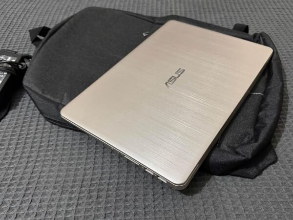 Asus Slim Laptop Golden Colour, Core i5 8th Gen, Ram 8GB, SSD 128GB, HDD 500GB For sale at Kolabagan